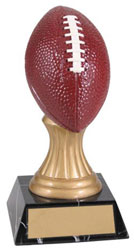 SFootball on gold pedestal